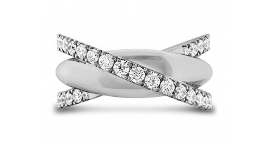 a white gold fashion ring featuring diamond accents